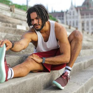 Close up of a man's sneakers during exercise.