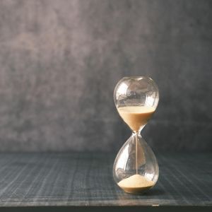 Stopwatch on the floor measuring workout time.